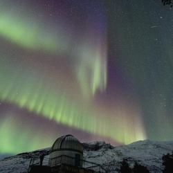Aurora above astronomical dome Skibotn Norway